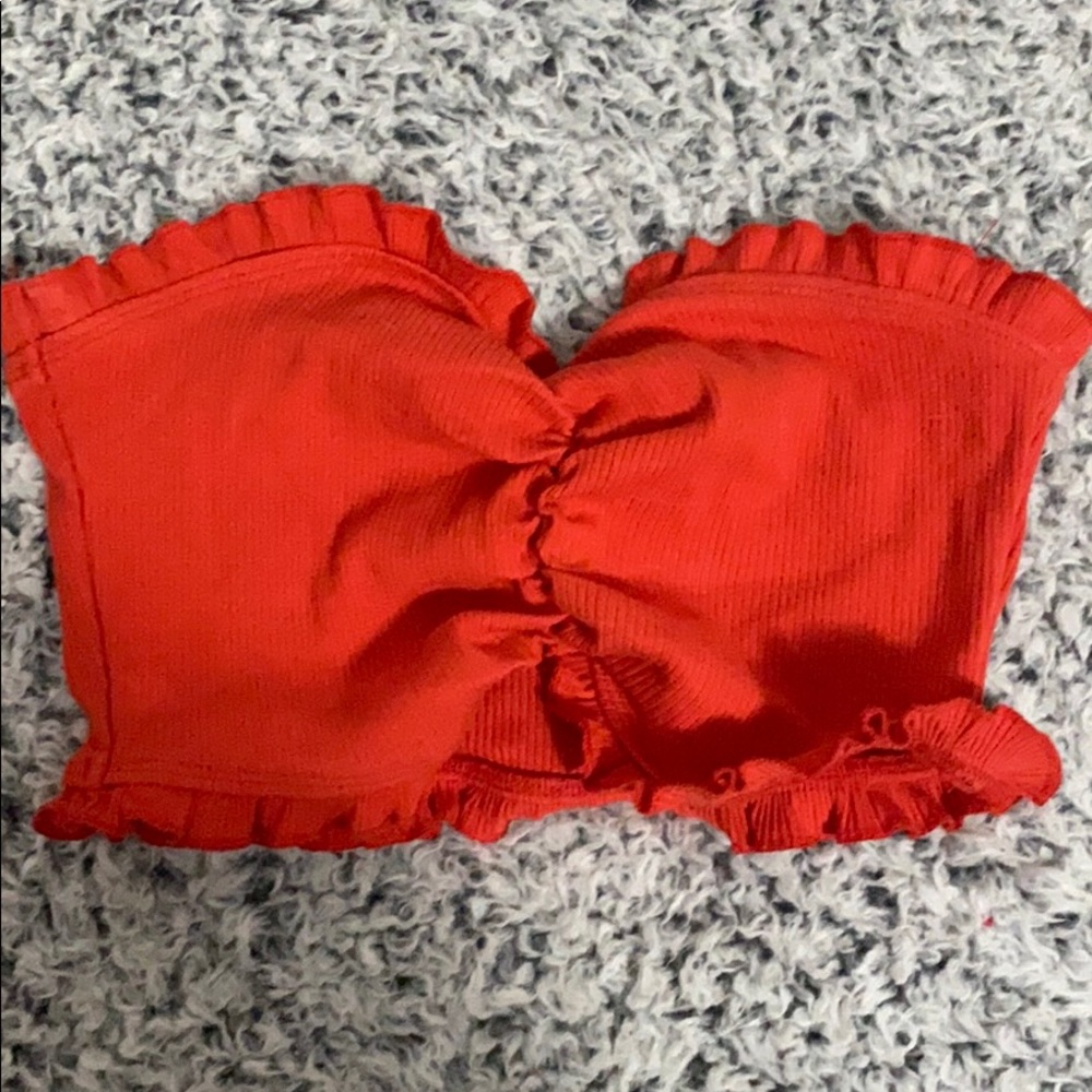 Red frilly tube top